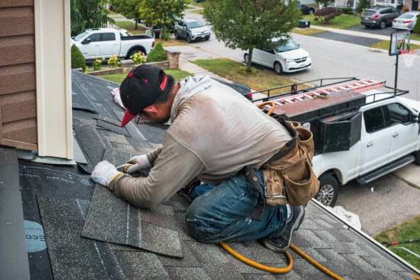 Professional Roofing technician working in North Kingstown, RI